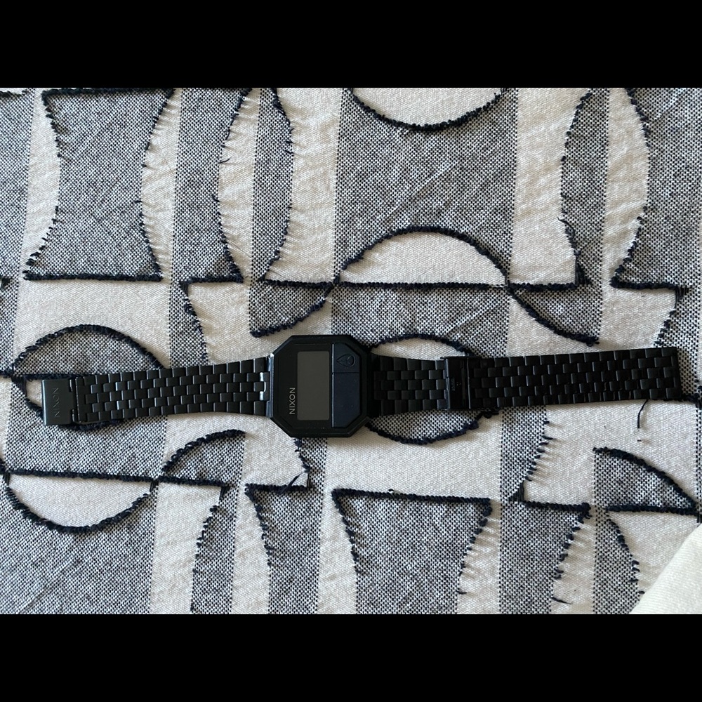 Nixon rerun all black watch.